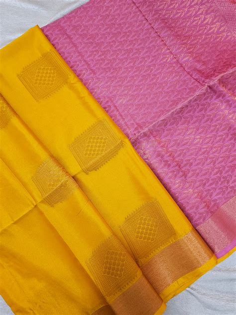 Yellow with Onion Pink Copper Zari Woven Border Semi Soft Silk Saree ...