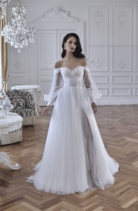 A-line Wedding Dress With Off The Shoulder Long Sleeves | Kleinfeld Bridal - wedding dress with shoulder sleeves