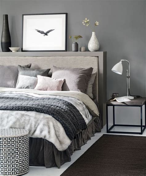 bedroom decor with grey headboard
