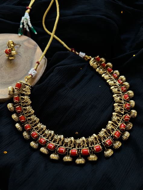 Coral studded elephant necklace with studs – House of Jhumkas