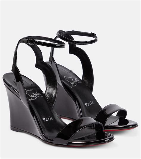 Patent leather wedge sandals in black - Christian Louboutin | Mytheresa