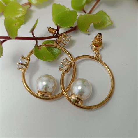 Buy Designer AD Earrings Online | Elegant and Affordable Jewelry – Tnaika™