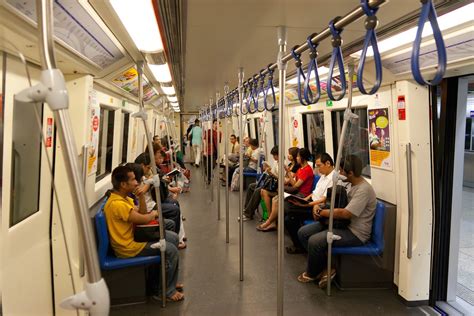 Passengers in the MRT subway in Singapore Stock Photo - Alamy