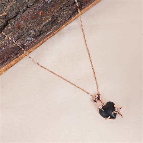 CKLAKART's Rose Gold Toned Sparkling Heart with Stars Pendant with Cha