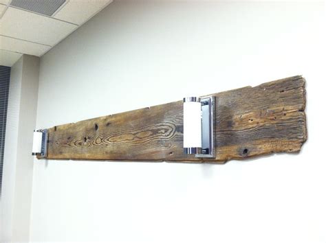 Reclaimed barn wood floor plank made into a headboard with light ...