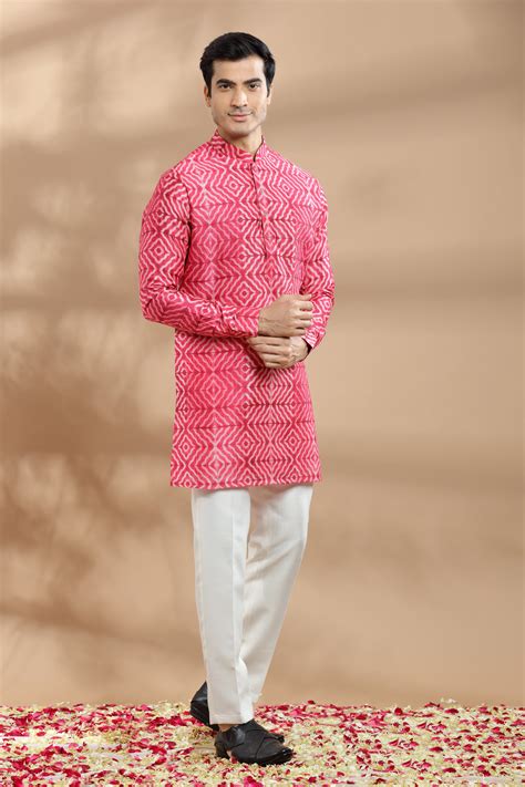 Red Tie Dyed Shibori Print Kurta with chudidar pants.