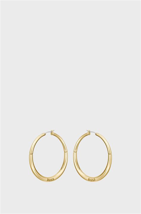 BOSS - Gold-tone hoop earrings with branding - Gold tone