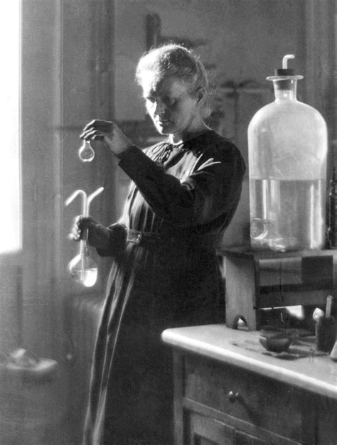Tech Giants: Knowing from atoms. This 1925 file photo shows professor Marie Curie working in her ...