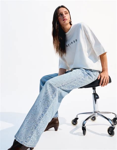 Wide-leg ‘90s shimmery jeans - Women | Bershka
