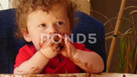 Baby Eating Chocolate Cake
