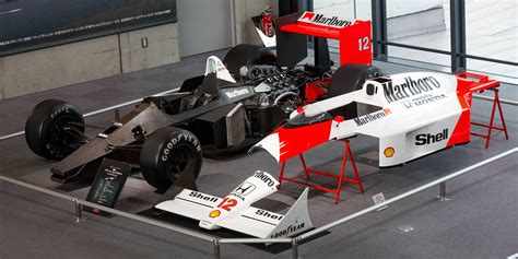 McLaren MP 4/4 with the bare chassis and cover Gerhard Berger, Nigel ...