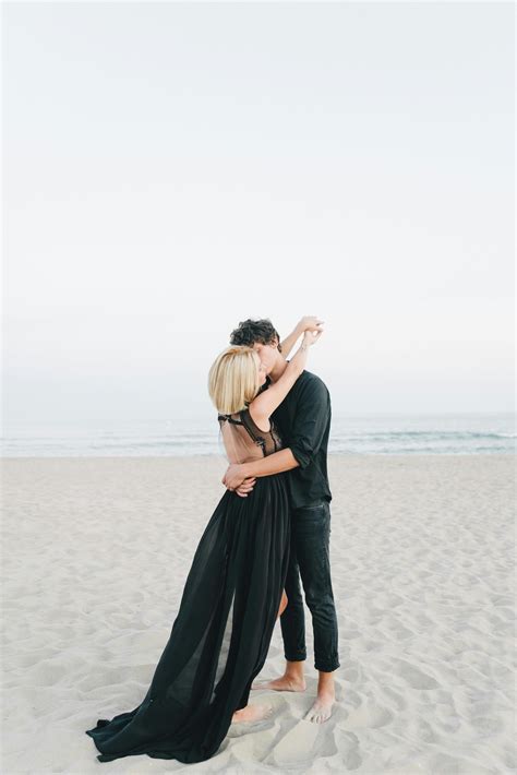 A Couple Kissing on the Beach · Free Stock Photo