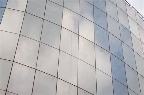 Premium Photo | Blue glass of windows building background