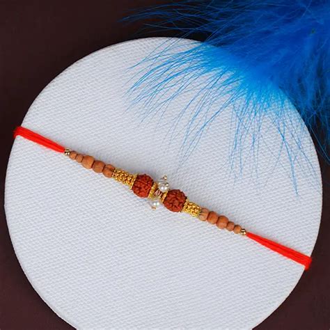 Send Double Blessings Rudraksha Rakhi for Brother Online | Rakhibazaar.com