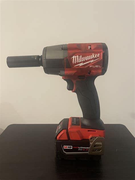 Milwaukee 1/2” Impact Gun AND Battery for Sale in Atlanta, GA - OfferUp