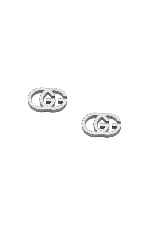 Gucci Running G Stud Earrings in 18KT White Gold | FWRD