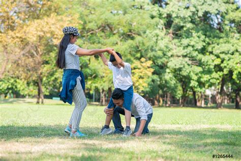 Parents and Kids Playing 的图像结果