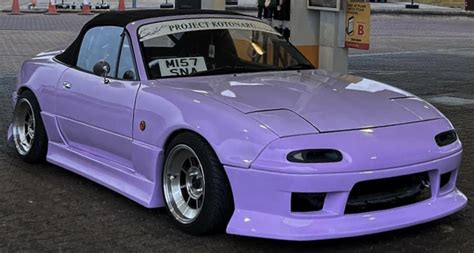 Purple Miata MX5 Parked at Gas Pump