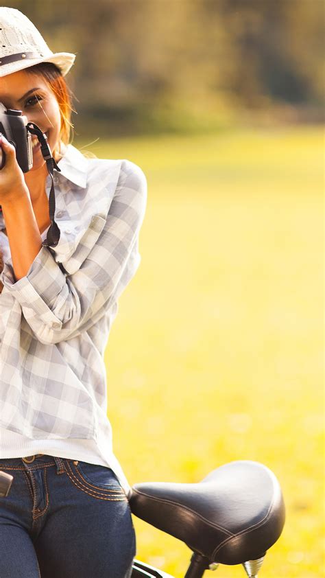 Download wallpaper greens, girl, bike, smile, hat, the camera, brown ...