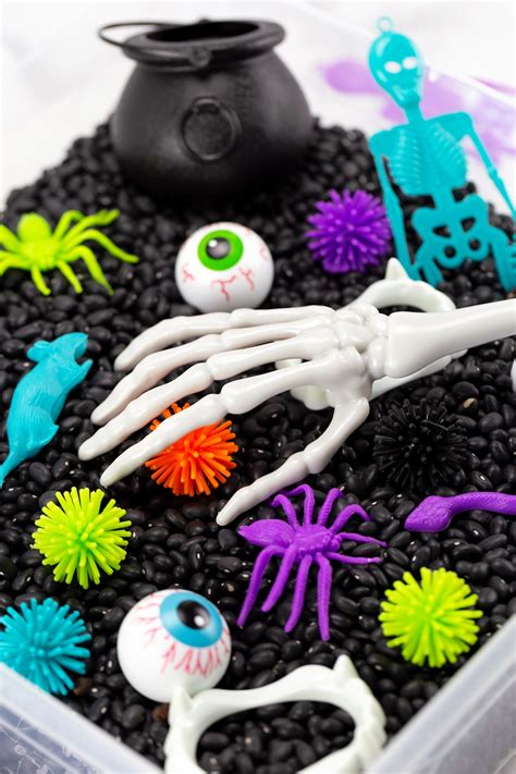 Halloween Sensory Bin - Fireflies and Mud Pies