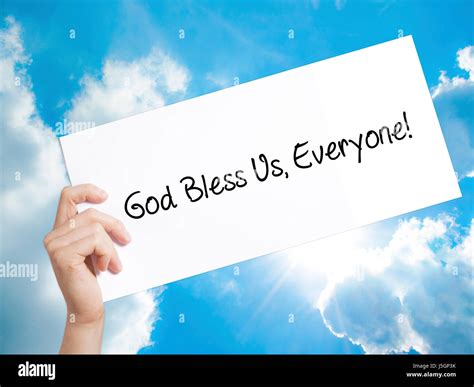 God Bless Us, Everyone! Sign on white paper. Man Hand Holding Paper ...