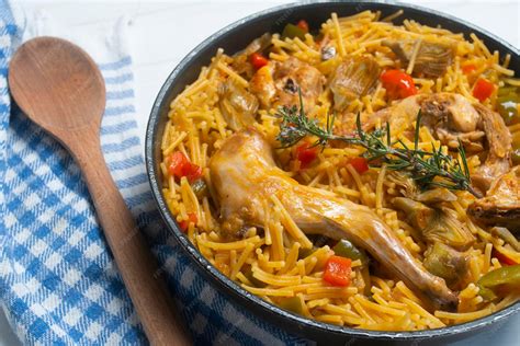 Premium Photo | Recipe fideua with rabbit. casserole noodles with meat ...