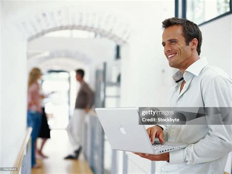 Businessman with Laptop 的图像结果