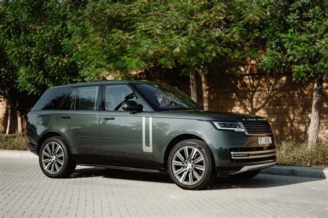 Rent Land Rover Range Rover HSE Green in Dubai - SUV - Octane.Rent