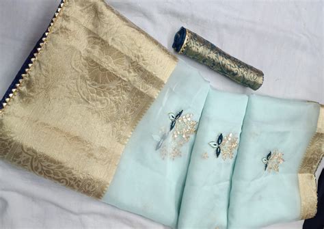 The Soft Elegant Weave of Organza Sarees: How to Drape Them to Look Ch ...