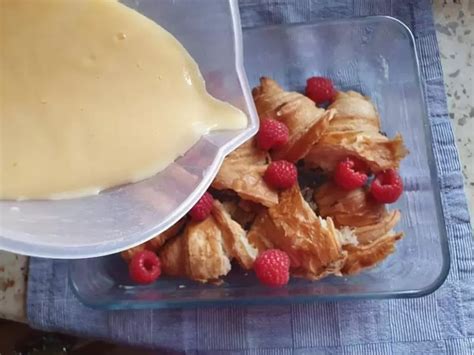 https://i0.wp.com/bubbablueandme.com/wp-content/uploads/2022/01/pouring-custard-over-croissants-and-raspberries.jpg?is-pending-load=1&resize=770%2C578