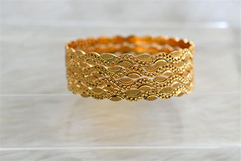 Gold tone Set of 4 designer bangles (2.10) dj-43020 – dreamjwell