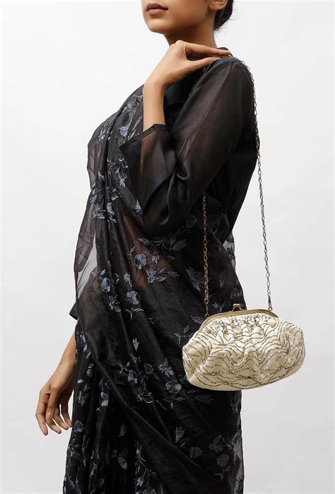 Camaira Golden Embellished Clutch Bag – SAAGAH