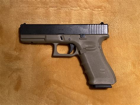 Glock G17 G5 FDE 9mm 17+1 4.49 FLAG - $526.24 (email for price) | gun.deals