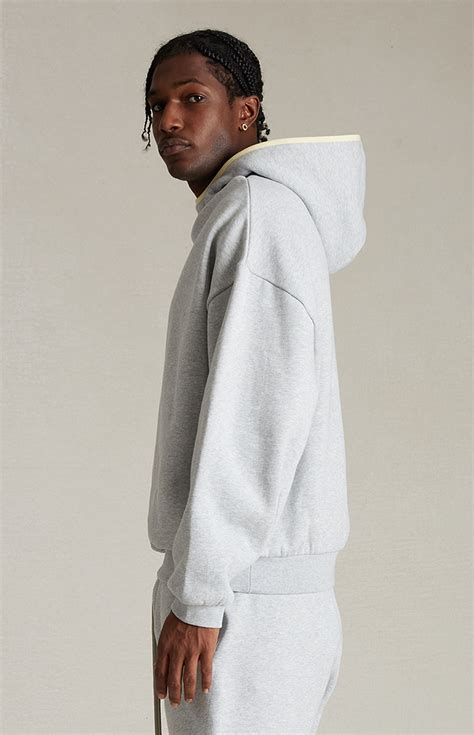 Fear of God ESSENTIALS Light Heather Grey Hoodie | Pacsun