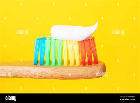 Bamboo toothbrush with toothpaste Stock Photo - Alamy