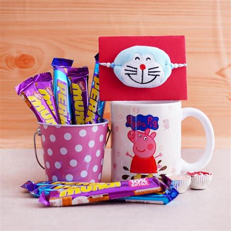 Send Doraemon Rakhi with Chocolate Bucket N Mug Online