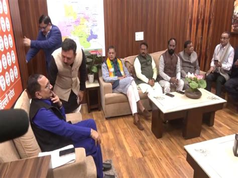 Delhi poll projections: BJP leaders meet at party office as early ...