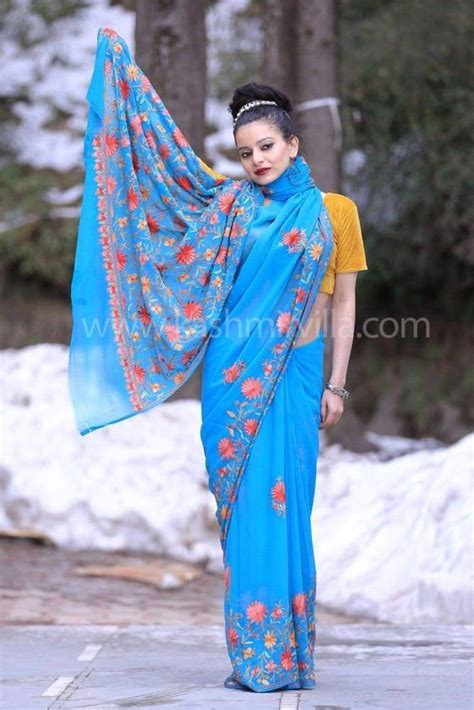 Blue color kashmiri work embroidered saree enriched with running jaal