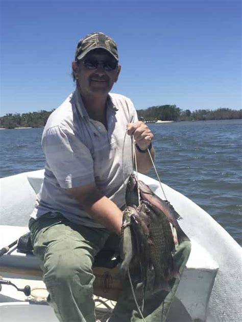 Putting Fish On Stringer 的图像结果