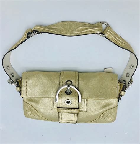 Coach shoulder leather metallic gold handbag# 8321 | Property Room
