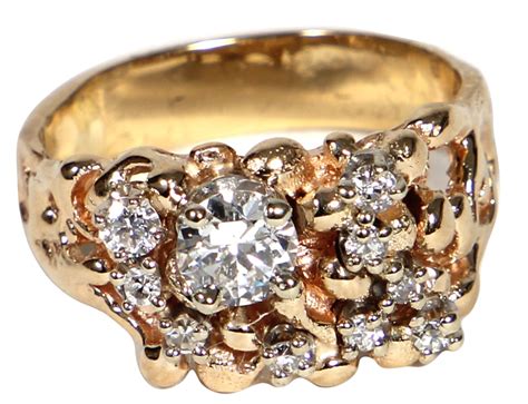 Lot Detail - Elvis Presley Owned and Worn 14kt Gold Diamond Cluster Ring