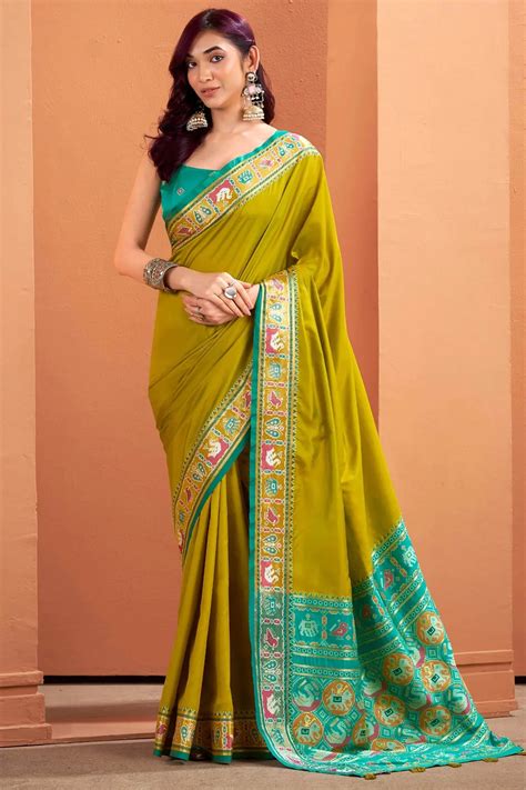 Yellow Patola Silk Saree with Traditional Weaving Border – Elegant ...