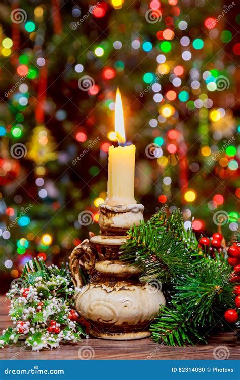 Burning Candle on Christmas Tree. Stock Photo - Image of candle ...