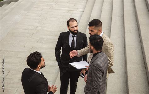 Group of Men in Suits 的图像结果