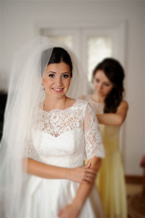 Image result for Bridesmaid Helping Bride