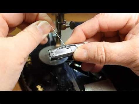 Image result for Loading Bobbin Singer