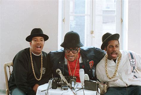 Download Run D.M.C Three Rappers Conference Wallpaper | Wallpapers.com