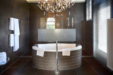 Luxury bathroom in hotel stock photo. Image of water - 35090982