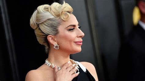 Lady Gaga reacts to 2023 Oscar nomination for her song 'Hold My Hand ...