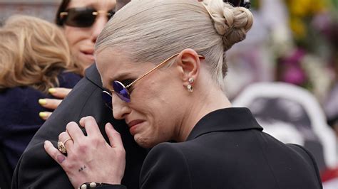 Emotional Kelly Osbourne fights back tears at dad Ozzy's funeral ...